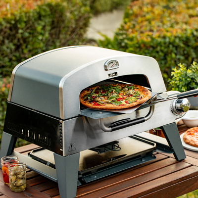 CUISINART<sup>&reg;</sup> 3 and 1 Grill and Pizza Oven - Explore endless cooking possibilities with the Pizza Oven Plus. The oven has a 13" pizza stone that distributes heat evenly. Also, features a preset pizza temperature setting that lets you cook with confidence. The cast iron griddle provides 230 square inches of cooking space. The grill is powered by a 15000 BTU burner and provides 260 square inches of cooking space. Temperatures exceed 700F for restaurant quality sear. Dual-hinged lid design with drop down pizza oven door.