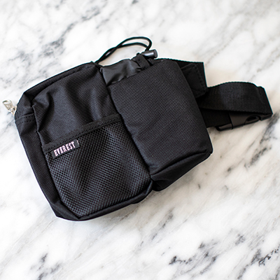 EVEREST<sup>&reg;</sup> Waist Bottle Pack—Features a Zippered Pouch with an Insulated Bottle Holder. For wear around the waist with snap-enclosure and measures 7&quot;x 7.5&quot;x 3&quot; 
